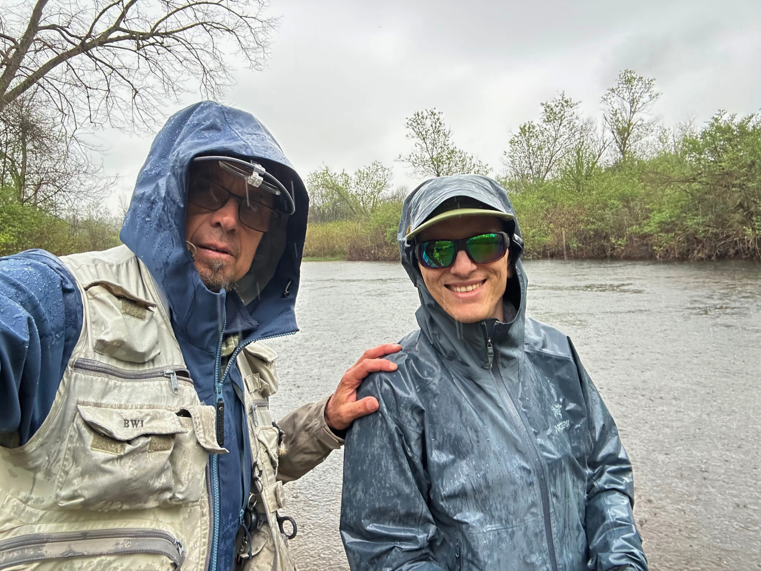 Fly fishing guide Brew Moscarello having fun in the rain on the Battenkill in Vermont